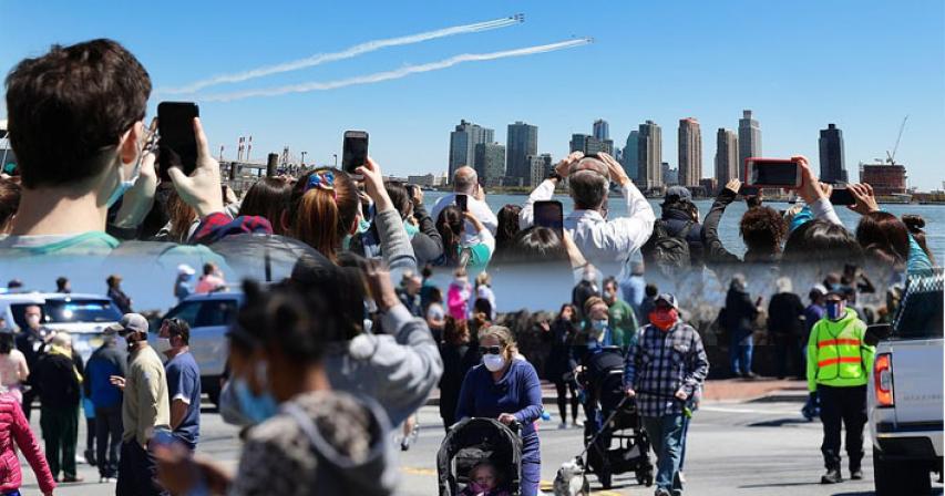 Thousands ignore stay-at-home order in US to watch 12 jets flyover as tribute to frontliners