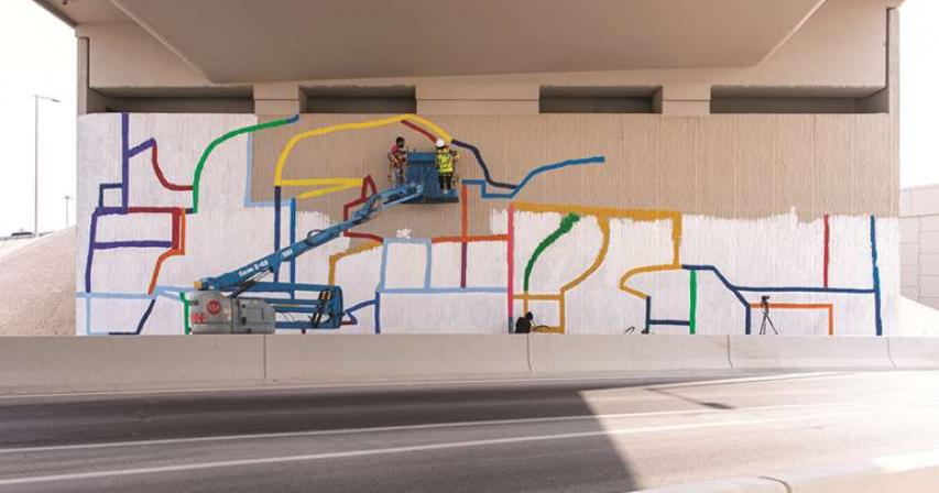 VCU-Q arts team paints huge 22-metre-wide visual treat on DFC interchange