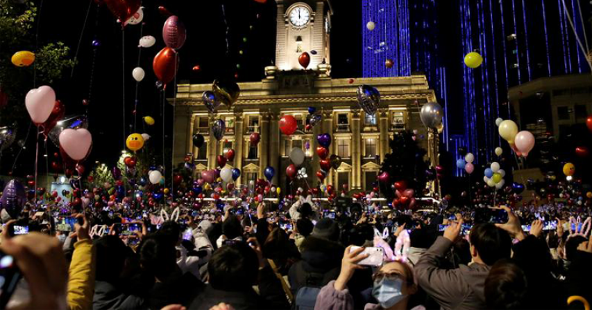 Crowds fill streets in China's pandemic-hit Wuhan, celebrate New Year