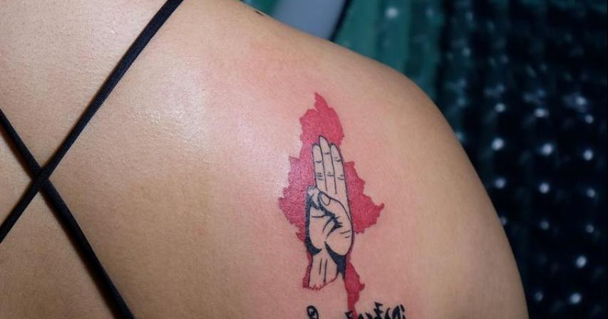 In Myanmar, people protest against military coup with tattoos 