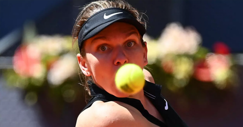 Halep knocked out of Madrid Open by Mertens
