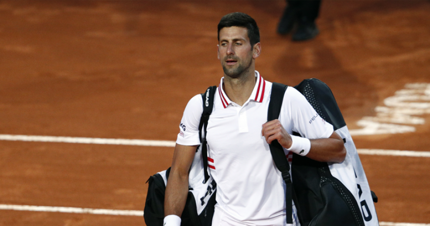 Novak Djokovic goes off on chair umpire for play-on during rain
