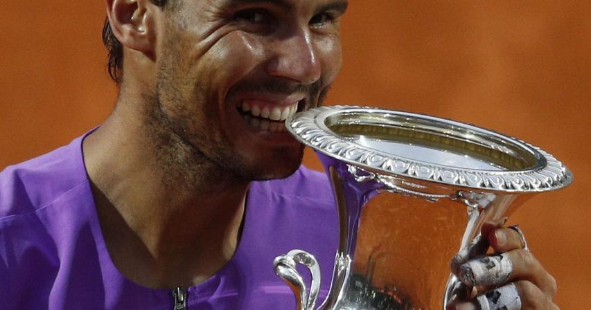 Nadal overcomes blip to scythe down Djokovic in Rome final