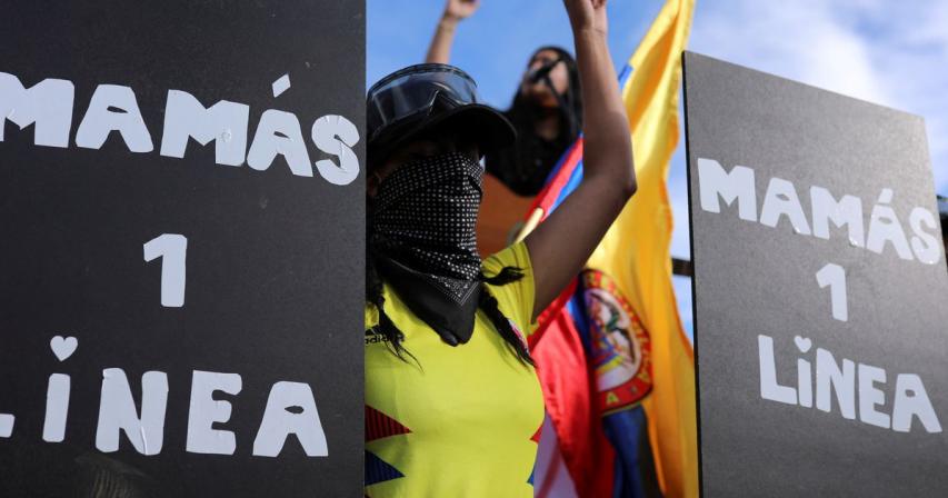 Amid tear gas and rocks, mothers take to front line of Colombia protests