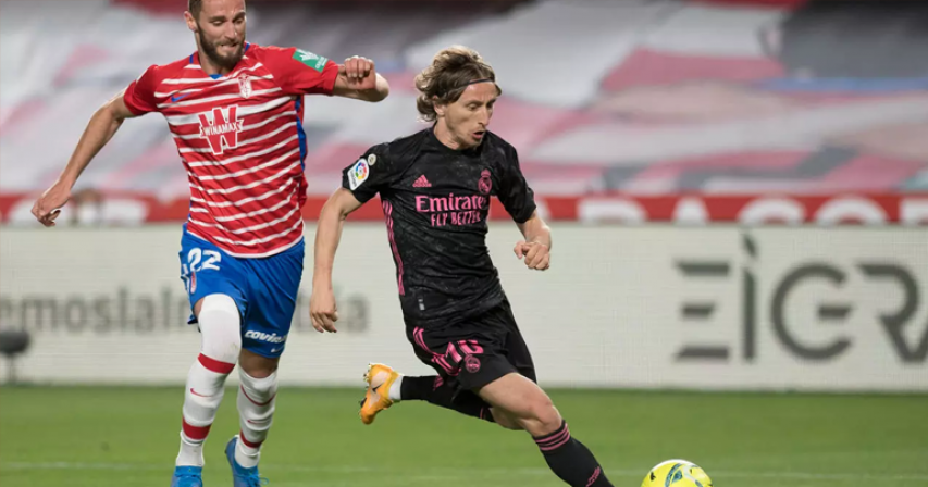Modric signs new Real deal until end of next season