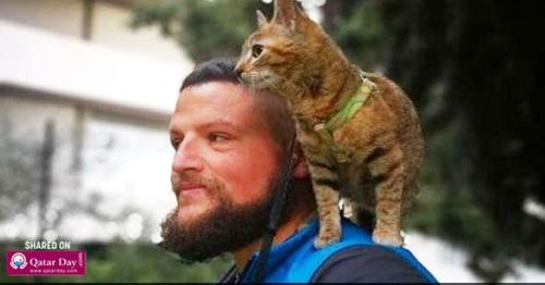 Meet The Man Who Is Biking Around The World, With A Cat On His Back
