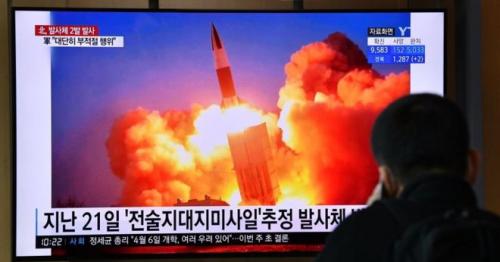 North Korea hails super large launcher test as virus timing condemned