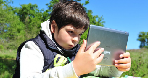 Italian boy travels a mile for internet signal to study under tree