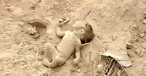 Newborn baby saved after found buried alive in India