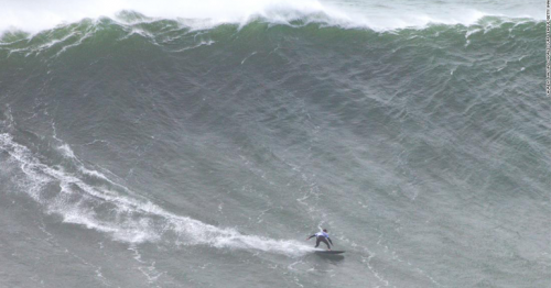 A Brazilian surfer broke her own Guinness World Records title by riding an epic wave