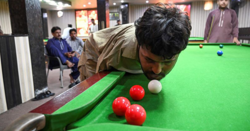 Born without arms, Pakistani snooker player masters the game