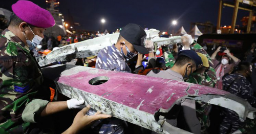 Indonesia says Boeing jet broke apart upon impact with water