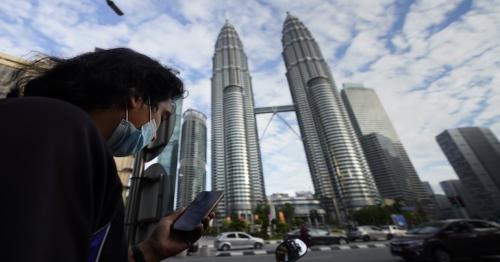 Emergency imposed in Malaysia over virus is reprieve for PM