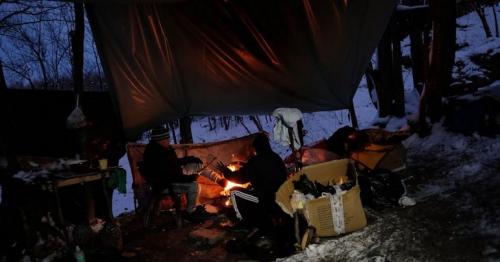 Stuck in Bosnia, migrants sleeping rough face up to winter