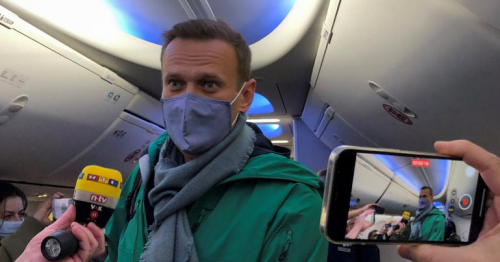 Kremlin critic Navalny boards plane in Germany to fly to Russia 