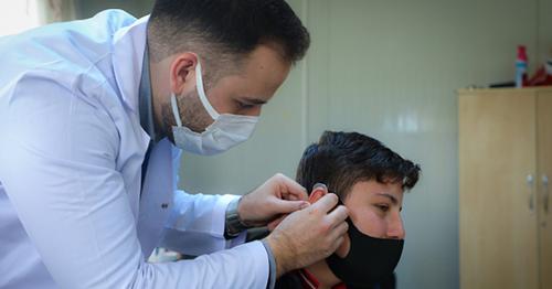 Qatar Charity provides hearing aids for Syrian refugees