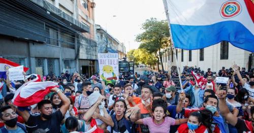 Fire, smoke, gunshots in Paraguay capital as pandemic response ignites protests