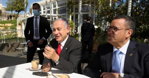 We're almost done with COVID curbs, Netanyahu says as Israel reopens restaurants