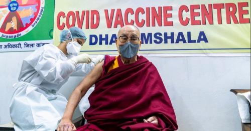 Dalai Lama urges others to get vaccinated as he receives first shot