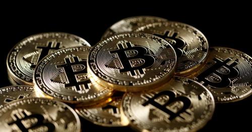 Bitcoin takes breather after retreat from record near $62,000