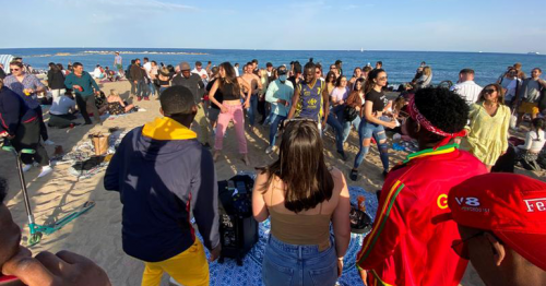 Beach partygoers in Spain's Barcelona defy COVID-19 restrictions 