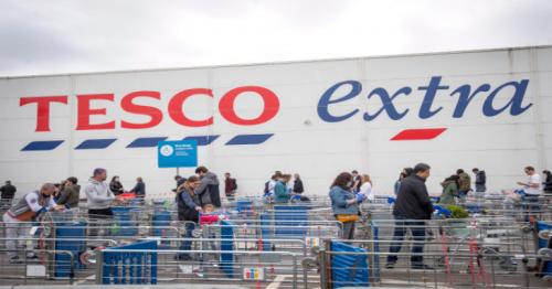 Tesco counts cost of Covid-19 trading as profits drop