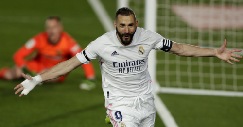 Benzema double sends Real top of La Liga