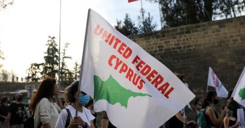 Ahead of Geneva talks, Cypriots march for peace