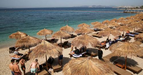 Hoping to lure back tourists, Greece reopens beaches after lockdown 