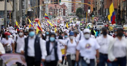 Thousands march in Colombia's Bogota to demand end to protests, roadblocks